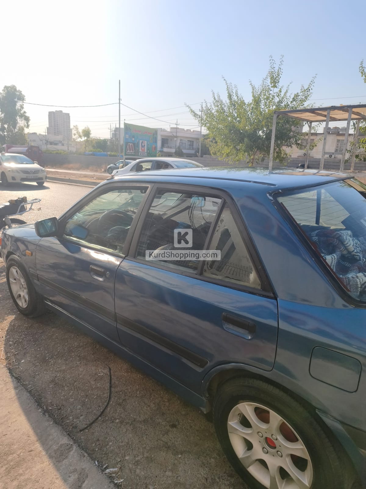 مازدا ٣٢٣ دژە فیتەر ١٩٩٠ هەموو شتی بەشەرت جوان و توندوتۆڵە
